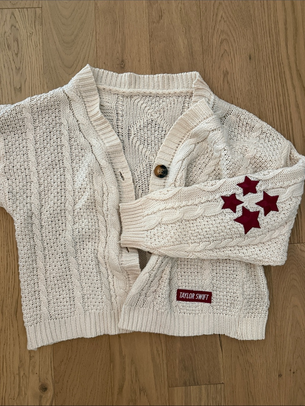 Taylor Swift Cream Cable Knit Cardigan with Red Star Appliqués